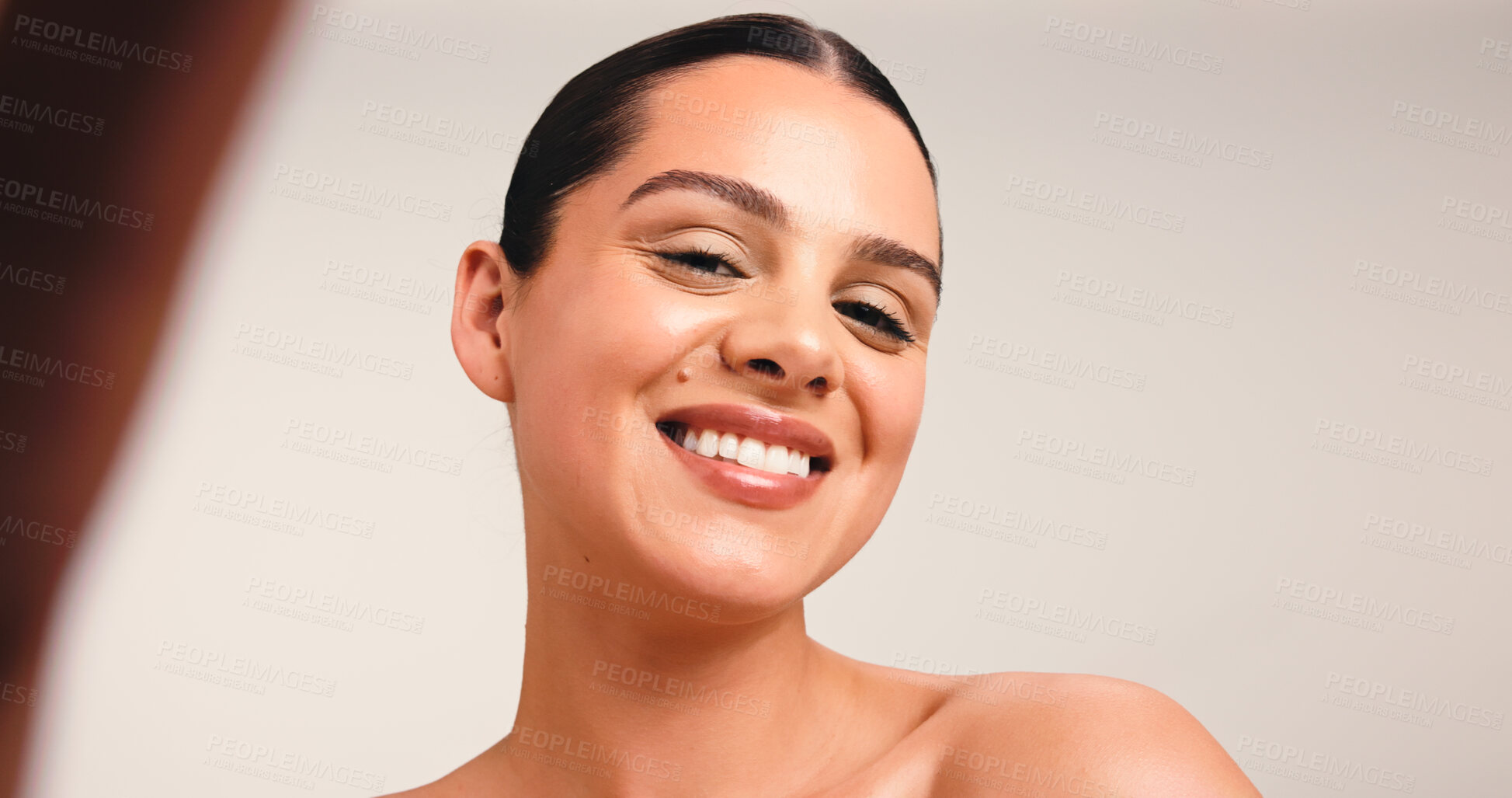 Buy stock photo Portrait, woman and selfie in studio, skincare and post for beauty tips on social media and picture. White background, influencer and person with smile for healthy skin, wellness and photography