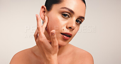 Buy stock photo Beauty, skincare and girl in portrait in studio with skin hydration, collagen results and glow. Clean, person and confidence on white background for anti aging treatment, natural makeup and self care