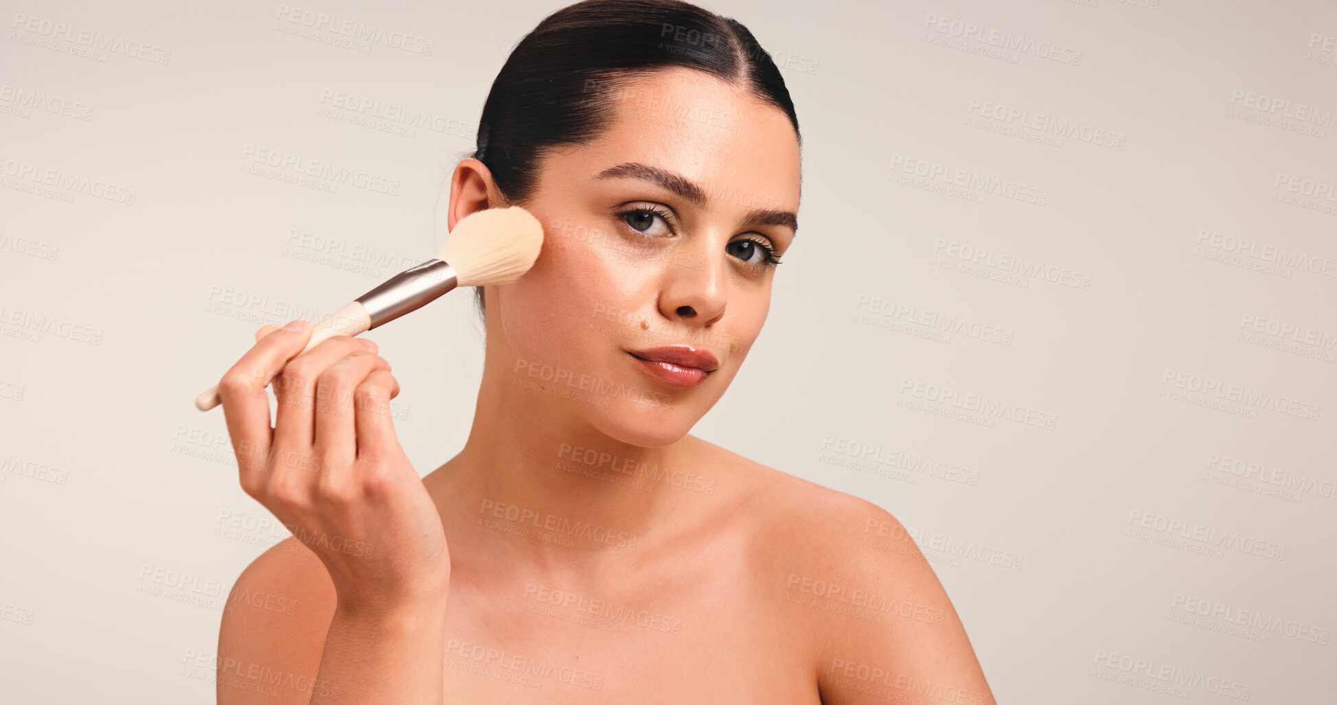 Buy stock photo Girl, makeup brush and portrait with beauty in studio, powder and application with pride on background. Woman, cosmetic tools and foundation with skin, confidence and mock up space in New Zealand