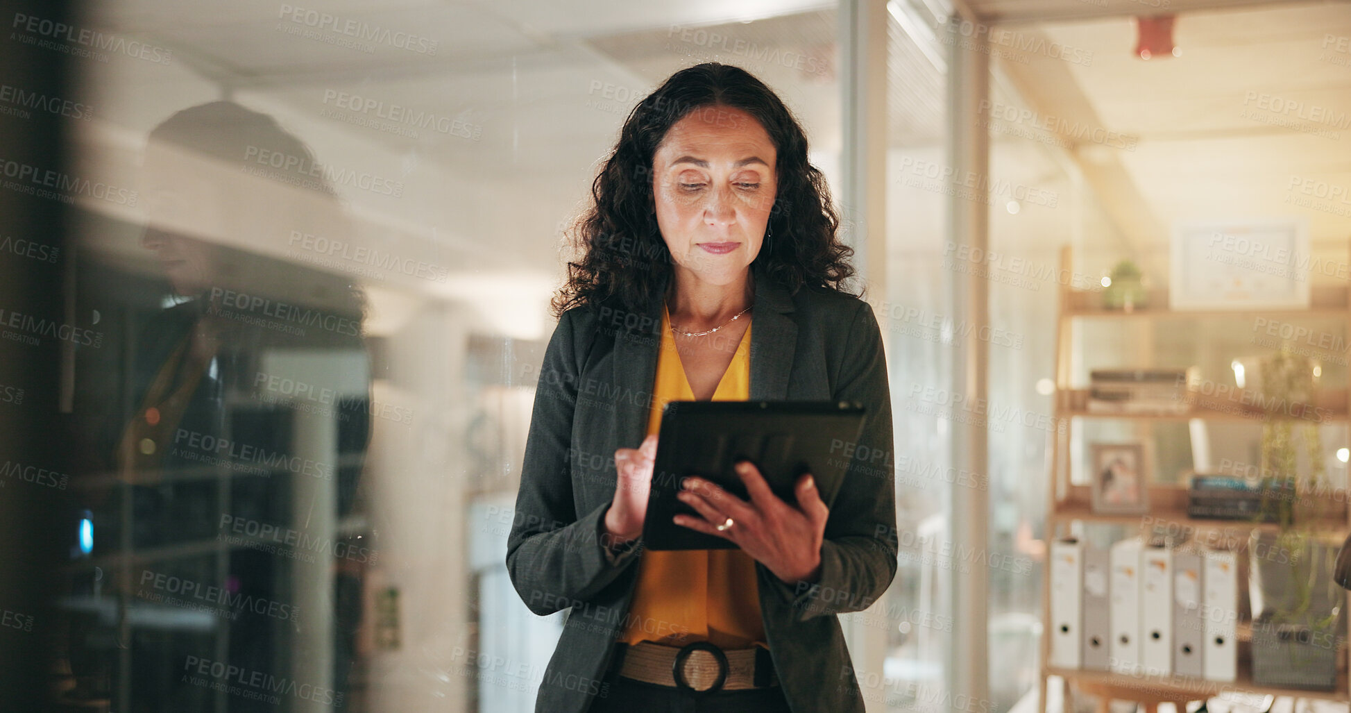 Buy stock photo Night, browsing and woman with tablet in office, financial analyst or preparing for proposal on web. Business, accountant and person with tech for investment opportunity, deadline and working late