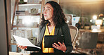 Computer, documents and tablet with business woman in office at night for review of information. App, paperwork and reading with corporate employee in workplace for evening administration or report