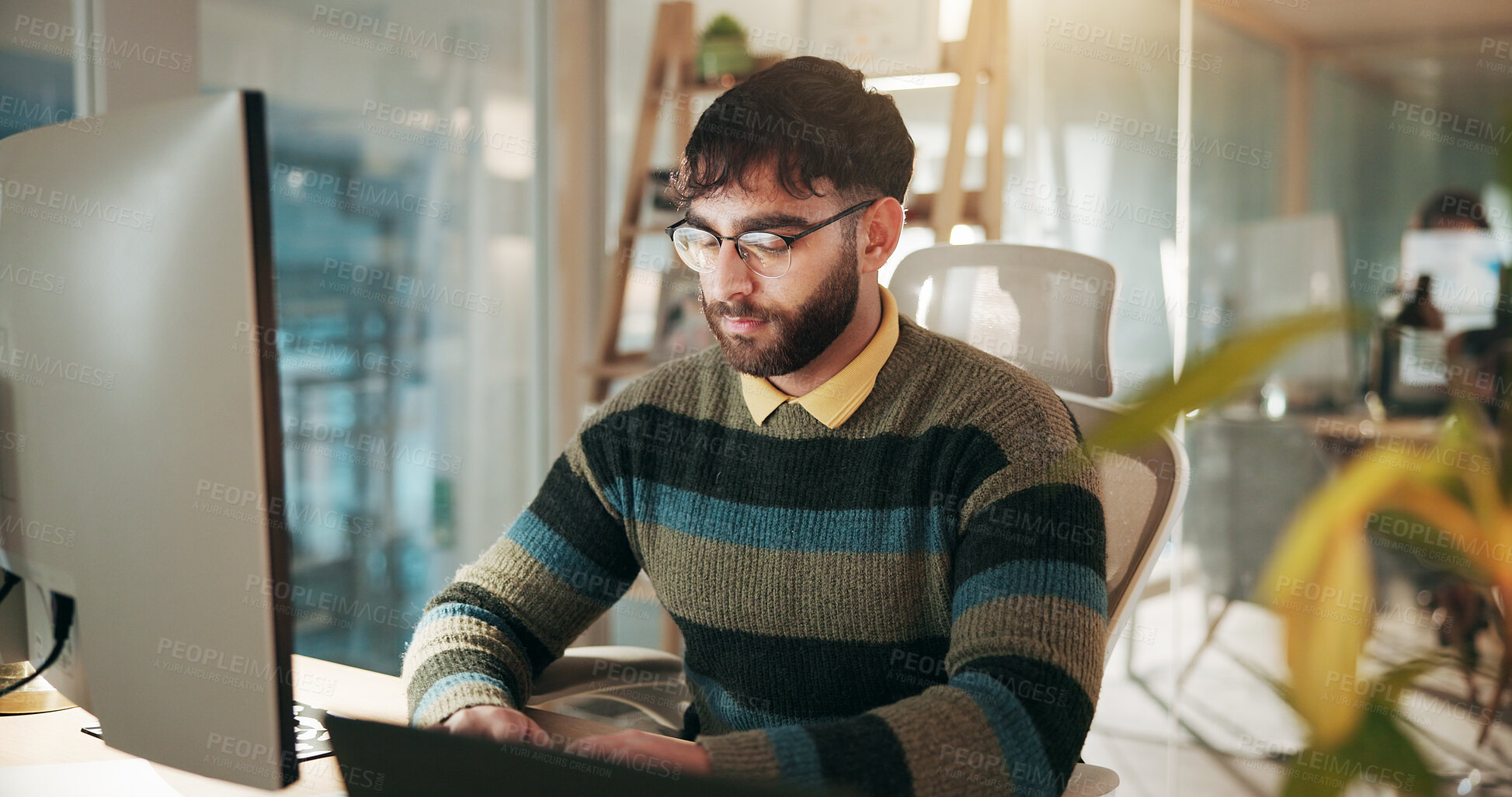 Buy stock photo Night, man and research on computer in office, deadline or accountant with assignment and corporate. Employee, working late and person with tech for financial report, online and budget on website