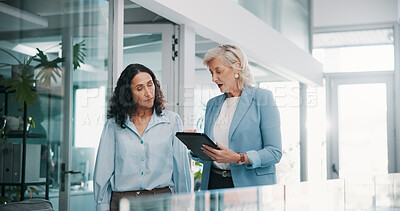 Buy stock photo Talking, office and business women on tablet for online proposal, revenue growth and expense report. Manager, corporate and people on digital tech for finance review, company budget and meeting