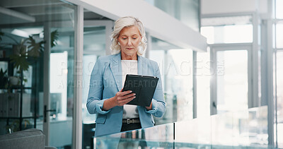 Buy stock photo Corporate, office and business woman on tablet for online proposal, revenue growth and expense report. Mature, professional and person on digital tech for finance review, company budget and planning