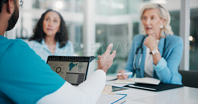 Buy stock photo People, laptop and doctor in hospital, medical team and cooperation with innovation. Employees, research and group in meeting, discussion and healthcare with support, planning and medicare feedback