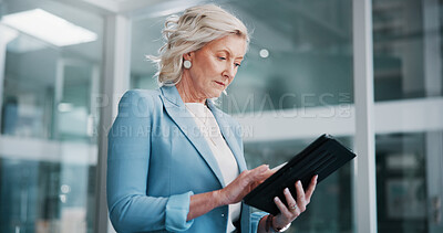 Buy stock photo Mature, corporate and business woman on tablet for online proposal, browsing app and expense report. Manager, office and person on digital tech for finance review, company budget and planning