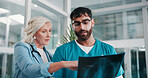 Doctors, x ray or people in hospital, cooperation or conversation with help, feedback or healthcare. Professional, medical diagnosis or employees in clinic, assessment of scan or teamwork with advice
