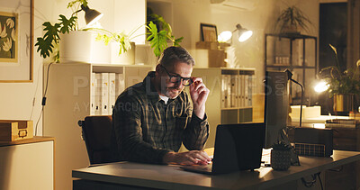 Buy stock photo Research, planning or man in office with laptop, reading or email update for digital marketing. Serious, thinking or working in career with tech, night or notification in business return for feedback