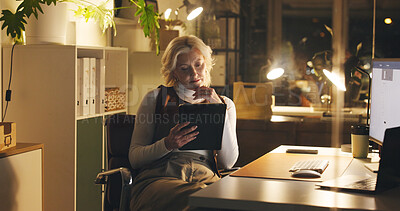 Buy stock photo Tablet, reading and mature businesswoman in office at night for creative project with deadline. Communication, email and professional editor with contact for article for publishing in workplace.