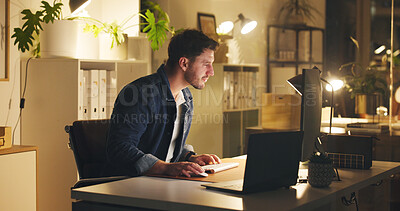 Buy stock photo Computer, reading and businessman in office at night for creative project with deadline. Technology, research and male magazine director working on article for publishing on website in workplace.