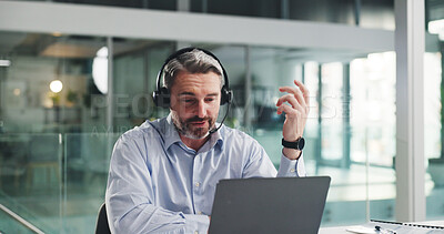 Buy stock photo Telemarketing, agent and man with laptop in call center, talk and communication for lead generation. Review, online and explaining offer to contact, conversation and mature person with tech for sales