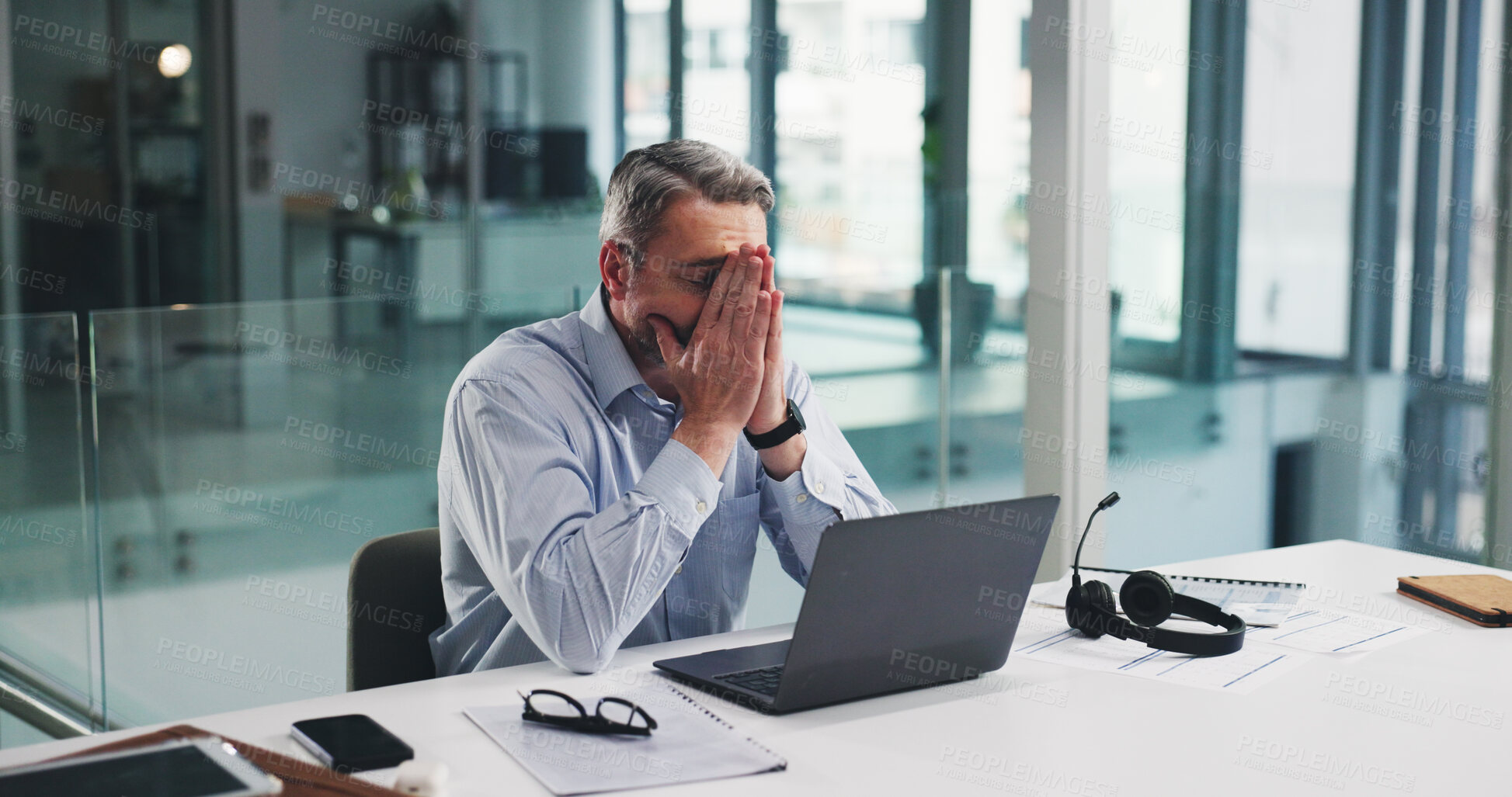 Buy stock photo Frustrated, businessman or laptop with stress for mistake, fail or bad news in office. Mature, man or financial advisor with anxiety, debt or loss for project deadline, finance or crisis in workplace