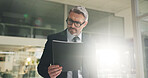 Reading, document and mature businessman in office, working late or accountant with investment info. Serious, employee and person with paperwork for funding application, flare and deadline at night