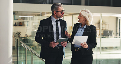 Buy stock photo Lobby, meeting and business people with paperwork, tablet and financial report for proposal. Corporate, finance management and woman with man talking for investment choice, planning and budget review