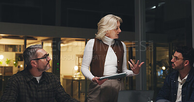 Buy stock photo Business people, tablet and meeting at night for brainstorming, schedule or project deadline. Group, employees or team working late with technology for creative development or agenda in office