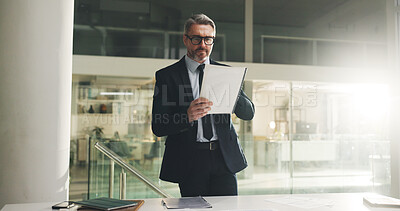 Buy stock photo Business, man or reading a file in office at night for financial reporting, risk management or compliance. Finance manager, mature person or documents for investment oversight, data analysis or flare