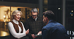 Business people, tablet and collaboration at night for brainstorming, schedule or project deadline. Group, employees or team working late with technology for creative development or agenda in office