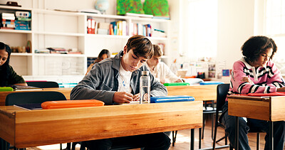 Buy stock photo Teenager, students and writing notes in classroom for education, lesson revision and quiz. Children, learner and learning with high school assignment, studying and information for academic curriculum