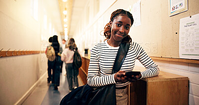 Buy stock photo Student, girl and smartphone in hallway at high school for text message, social media or online portal for assessment. Person, teenager and mobile app for academic communication or email on campus