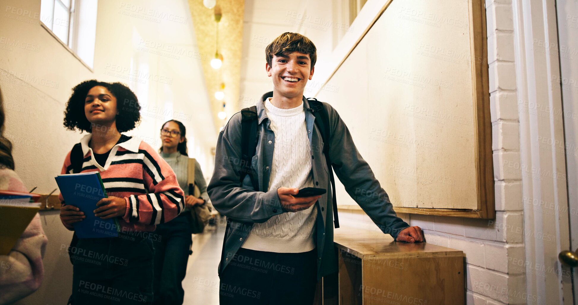 Buy stock photo Portrait, education and people in school with technology, walking and classroom allocation in hallway. Smile, learning and students in break with phone, schedule and group for academic success.