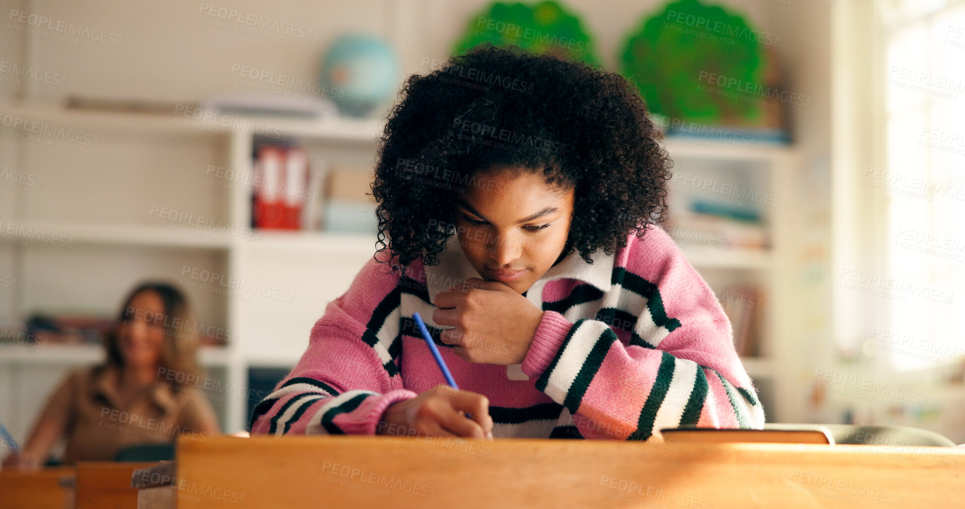 Buy stock photo Thinking, student and girl in classroom, writing and answer for quiz, assignment and decision. High school, teenager and learning with education, knowledge and academic lesson with problem solving