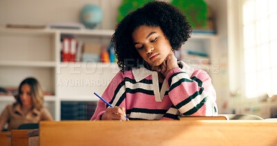 Buy stock photo Bored, girl and student writing in classroom for education, learning and studying burnout. Thinking, teenager and notes with exam pressure, academic problem and learner laziness for school assignment