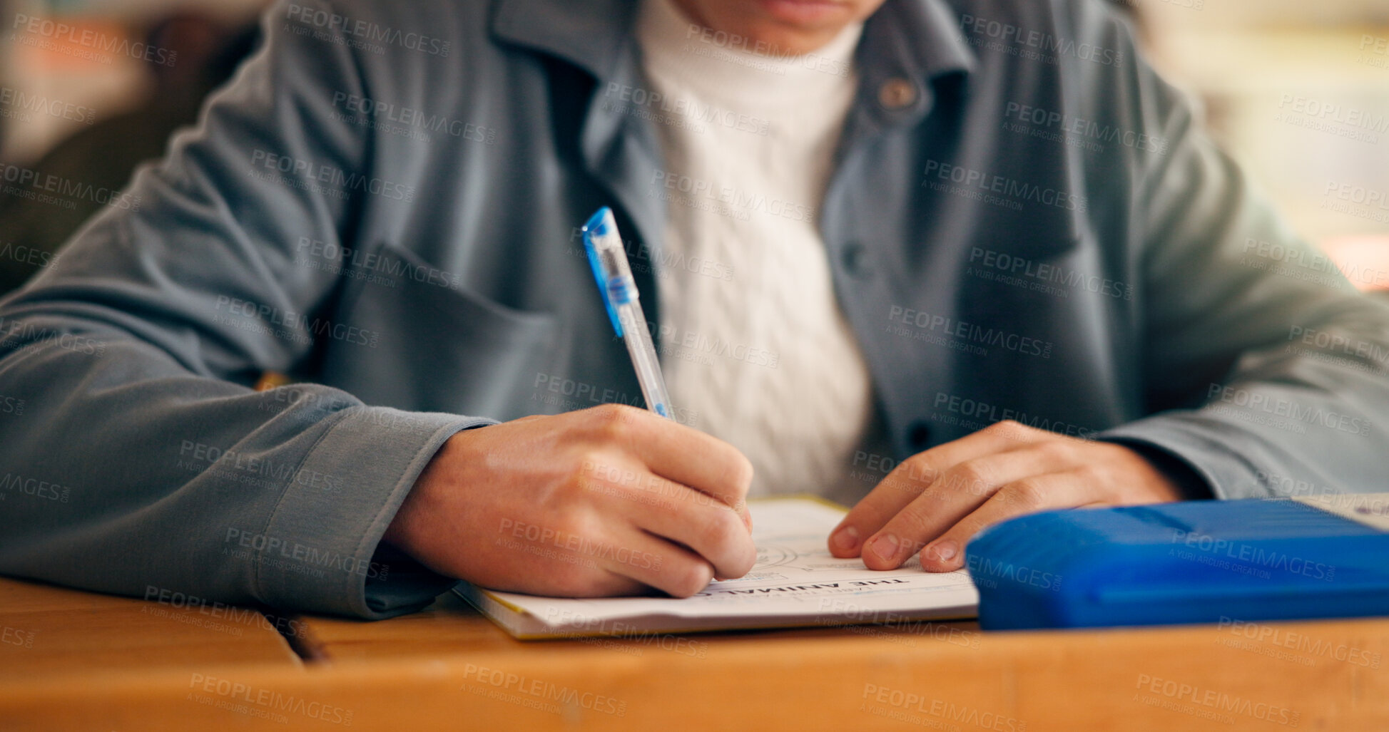 Buy stock photo High school, hands and student writing in classroom for aptitude test, entrance exam or learning. Education, knowledge and person with paperwork in lesson for scholarship essay or academic assessment