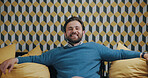 Business man, smile and relax on couch with portrait, lounge area and mental break at workplace. Happy, person and positive mindset in staff room with peace, comfortable and chill for stress relief