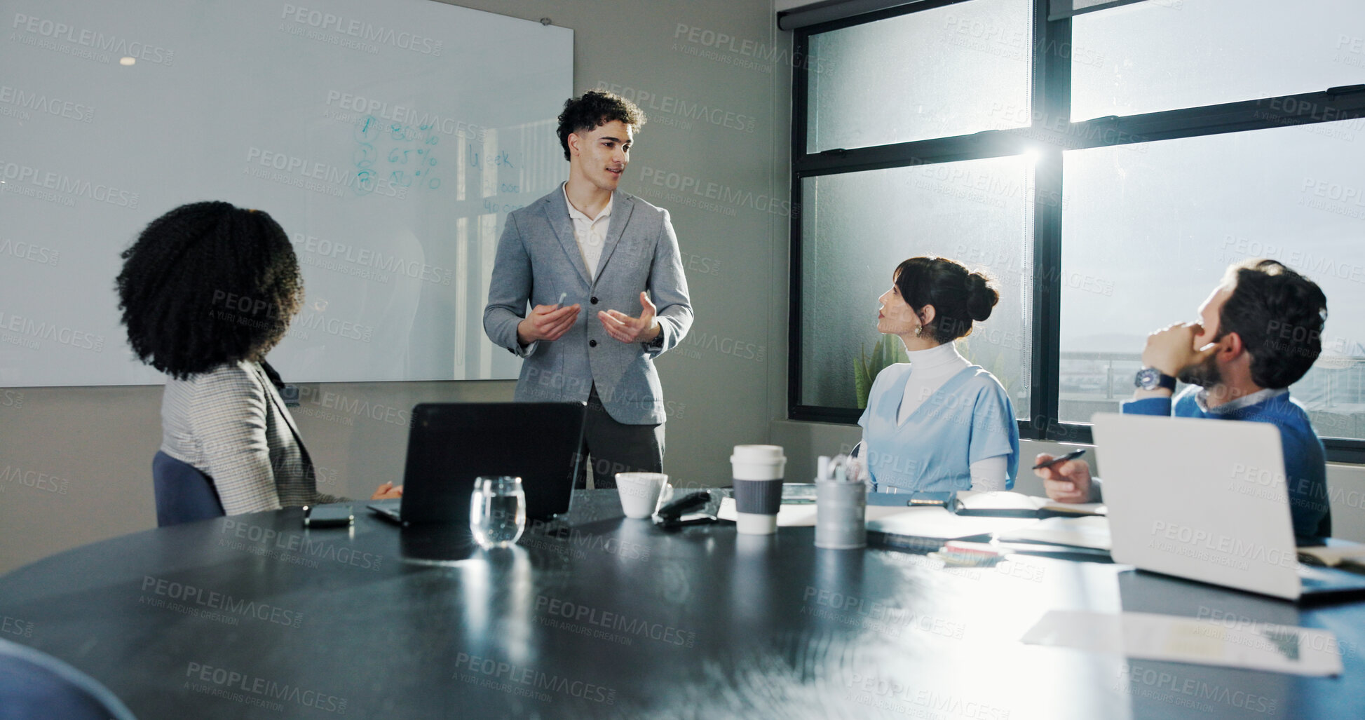 Buy stock photo Business, people and man at whiteboard in meeting for finance pitch, investment request or proposal. Financial stakeholders, speaker and listening in boardroom for funding negotiation or growth stats