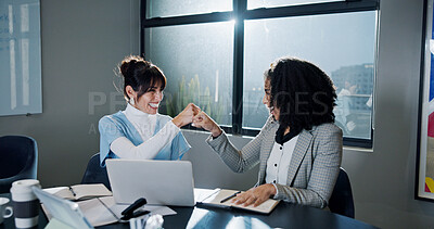 Buy stock photo Happy women, fist bump and meeting with laptop in office for winning, celebration or teamwork. Excited, female people or employees with smile or touch for good news, promotion or project success