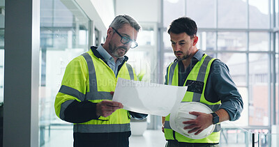 Buy stock photo Civil engineer, talk and men with blueprint, conversation or collaboration for property development. Architect, project or people with floor plan for architecture, flare and discussion for renovation