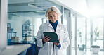 Tablet, mature woman and doctor in hospital with medical research, administration or communication. Digital technology, email and professional female healthcare worker with online contact in clinic.