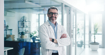 Buy stock photo Happy, crossed arms and portrait of doctor in hospital with confidence for medical support career. Smile, professional and mature male healthcare worker from London with pride for service in clinic.