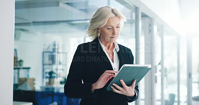 Buy stock photo Office, employee and mature woman with tablet, realtor and browse listing on website or real estate. Online, broker and person with tech for property research, scroll and planning for virtual tour