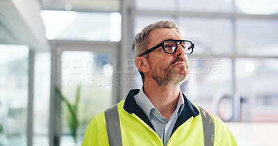 Engineer, construction site and mature man for urban planning, thinking or decision for architecture development. Inspection, insight and contractor with project management for civil engineering