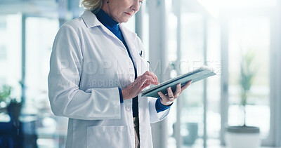 Buy stock photo Technology, mature woman and doctor in hospital with medical research, administration or communication. Tablet, email and professional female healthcare worker with online contact in clinic lobby.