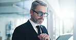 Smile, tablet and glasses with business man in office for stock broker, research and investment report. Portfolio manager, planning and account budget with mature person in agency for online trading