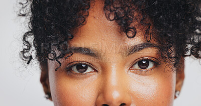 Buy stock photo Portrait, black woman and eyes with skincare in studio for beauty, laminated eyebrows and natural glow. Person, cosmetics and facial shine from dermatology, treatment results and white background