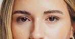 Portrait, woman and eyes with beauty in studio for skincare, fluffy eyebrows and eyelash extension. Female person, natural cosmetics and facial shine from dermatology, treatment results and closeup
