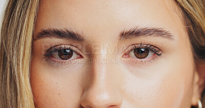 Buy stock photo Portrait, woman and eyes with beauty in studio for skincare, 
laminated eyebrows and eyelash extension. Female person, cosmetics and lashes growth for transformation, treatment results and closeup