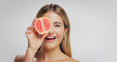 Buy stock photo Grapefruit, beauty and portrait of woman in studio for skincare, wellness and detox on white background. Happy, space and person with organic products, natural cosmetics and dermatology benefits