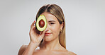Avocado, beauty and portrait of woman in studio for skincare, wellness and detox on white background. Mockup space, health and person with organic products, natural cosmetics and dermatology benefits