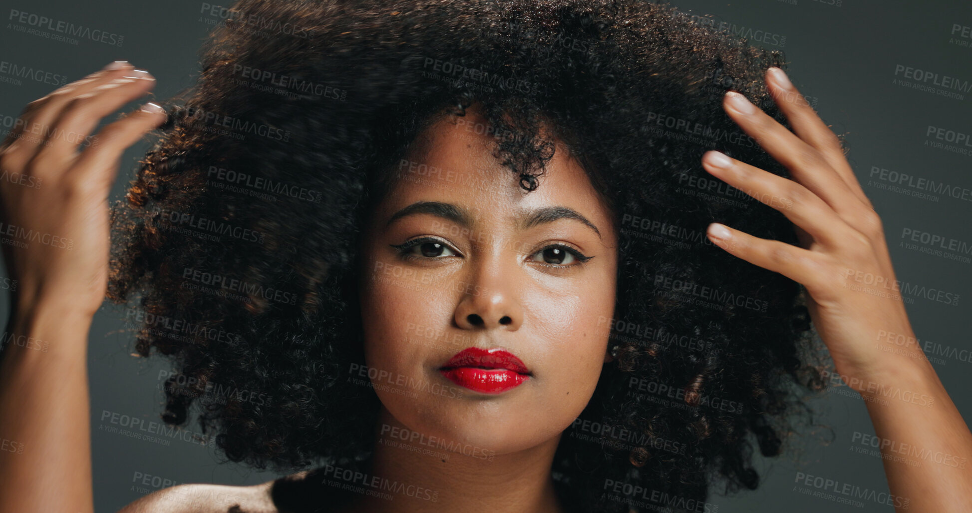 Buy stock photo Hair, hands and portrait with woman in studio for beauty, growth or natural volume of afro. Aesthetic, conditioner and shampoo with African model isolated on gray background for haircare results
