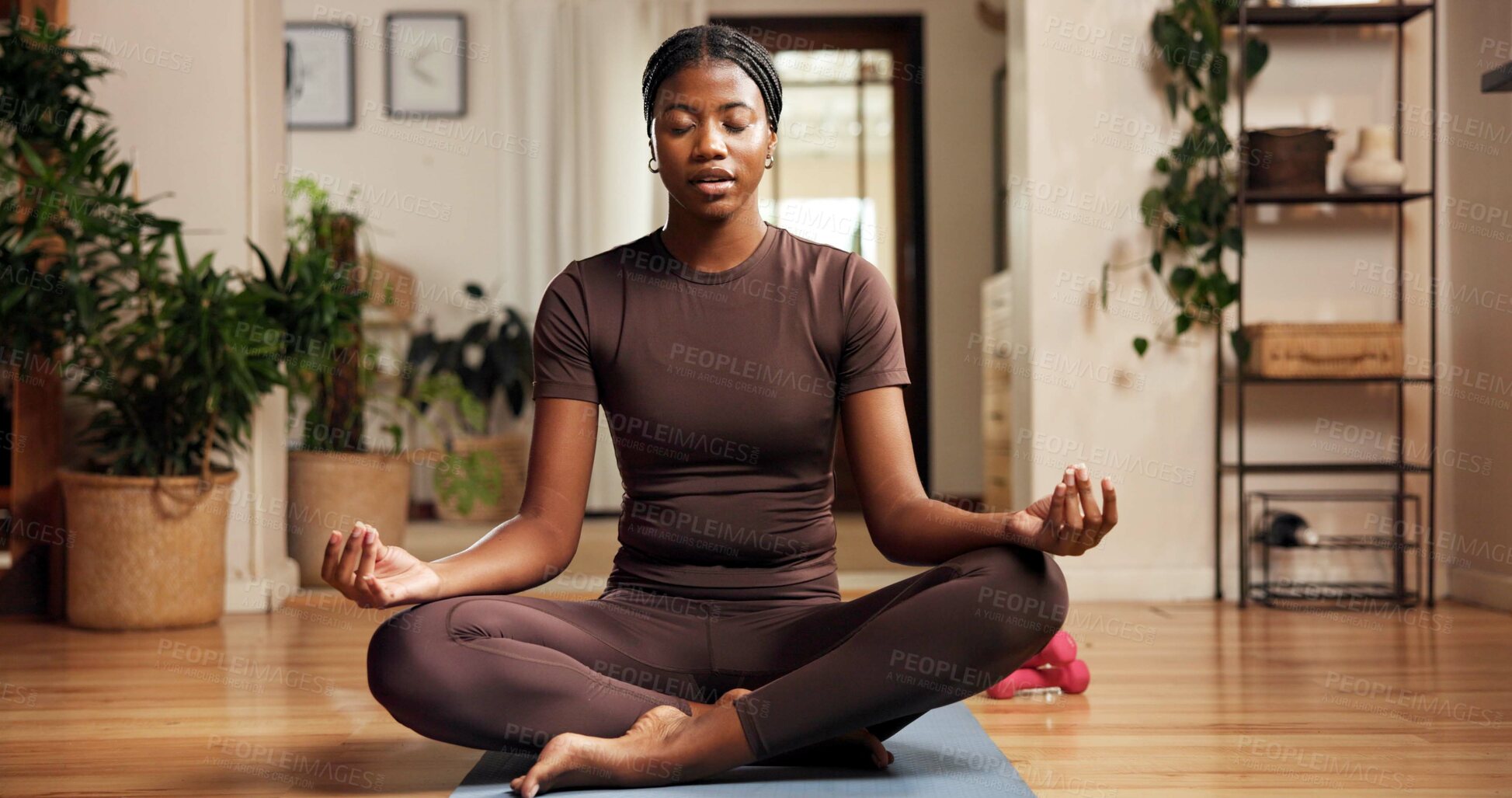 Buy stock photo Meditation, relax and yoga with black woman on floor in home for awareness, balance or zen. Aura, inner peace and mudra with African person in apartment for mental health exercise or mindfulness
