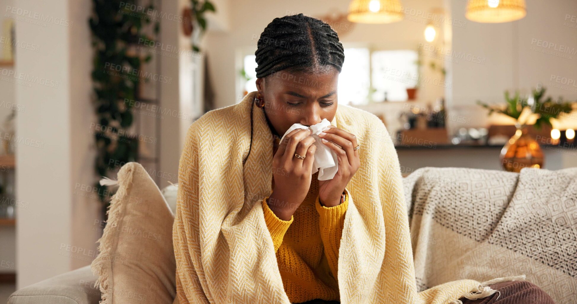 Buy stock photo Sick, black woman and blowing nose with tissue on sofa for influenza, allergy or sinus in home. Female person, flu or cold with toilet paper for viral infection, mucus or hayfever on couch in house