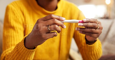 Buy stock photo Hands, pregnancy test and result with woman in living room of home for fertility or reproduction. Checking, ovulation and waiting with person closeup in apartment for family planning or ivf outcome