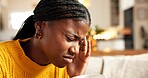 Black woman, headache and pain with stress on sofa for mental health, pressure or vertigo in home. Tired, female person or migraine with ache, dizziness or fatigue for mistake, fail or fever in house