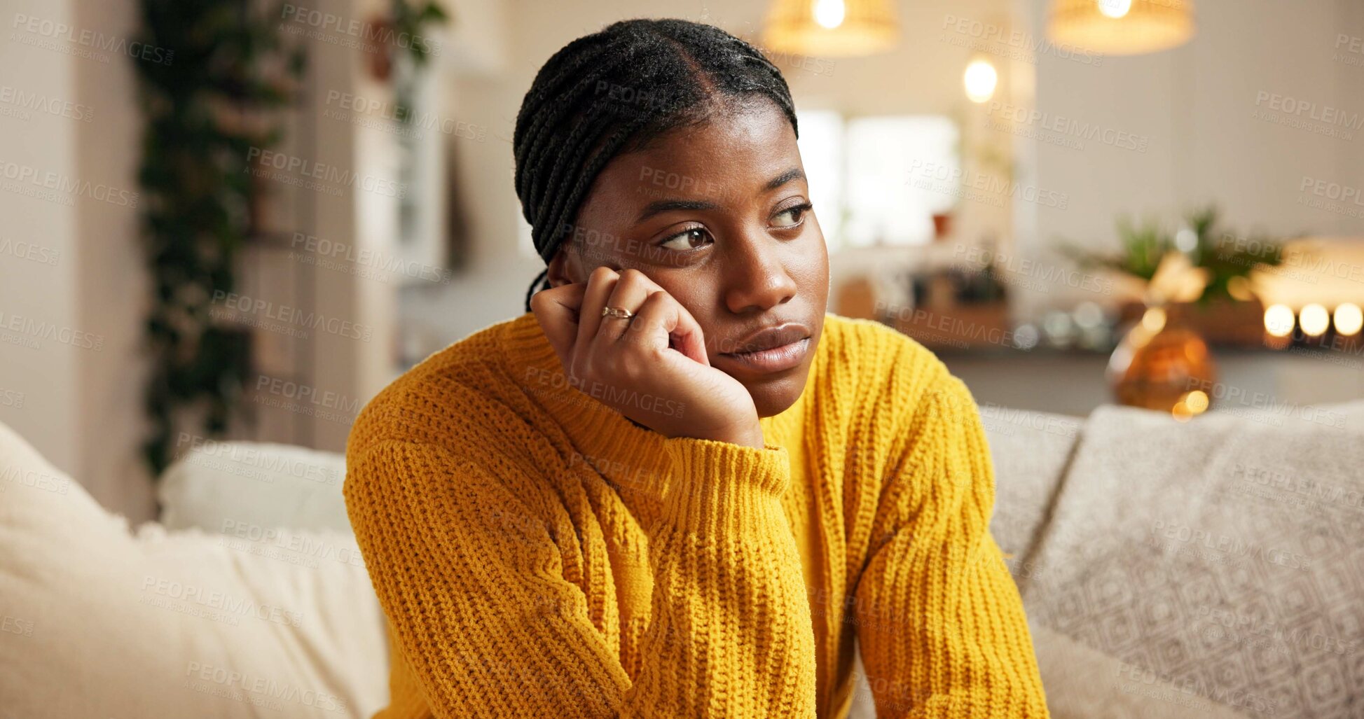 Buy stock photo Black woman, thinking and reflection on sofa in home for lazy weekend or indoor boredom. Stress, female person or daydreaming with deep thought on couch for contemplation or self doubt in house