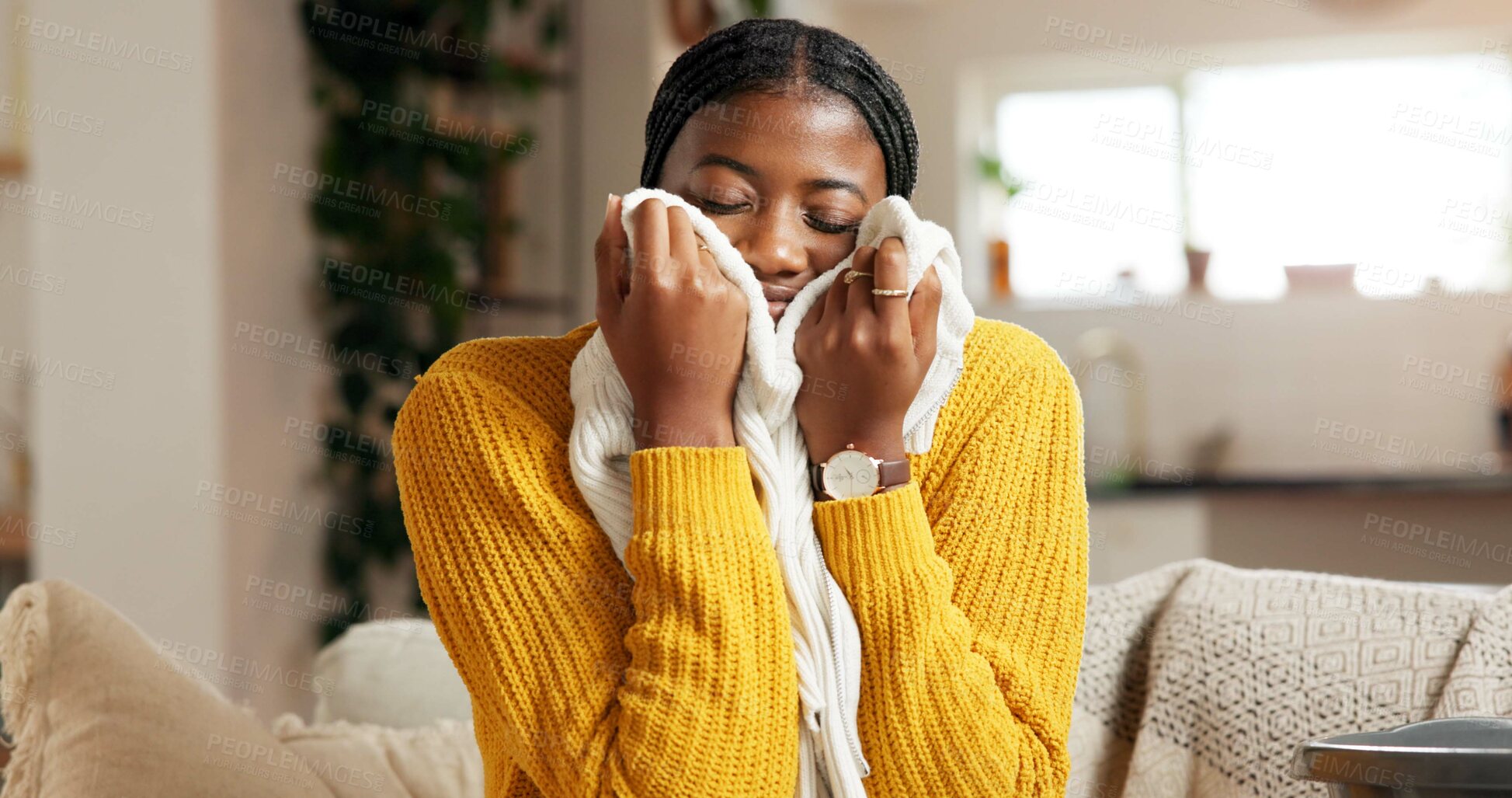 Buy stock photo Laundry, aroma and woman in home with clothing, housekeeping or fresh scent in spring clean. Happy, comfort and person in living room with material, domestic chores and smell of fabric softener.