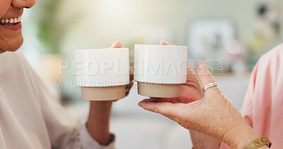 Buy stock photo Cheers, friends and women with coffee, hands and bonding together with retirement, reunion and celebrate. Mature people, home and toast with herbal tea, love and mug with care, break and happiness
